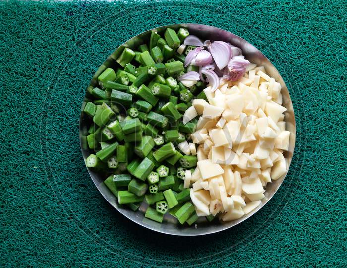 Healthy vegitable green ladyfingers potato chips onion chops