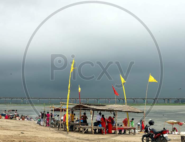Dark clouds gather over the banks of River Ganga in Prayagraj on July 07, 2020