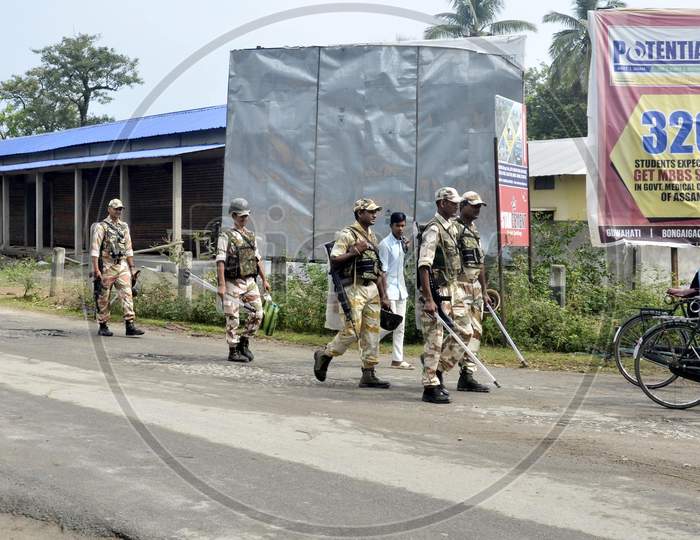 security personnel patrol on a road