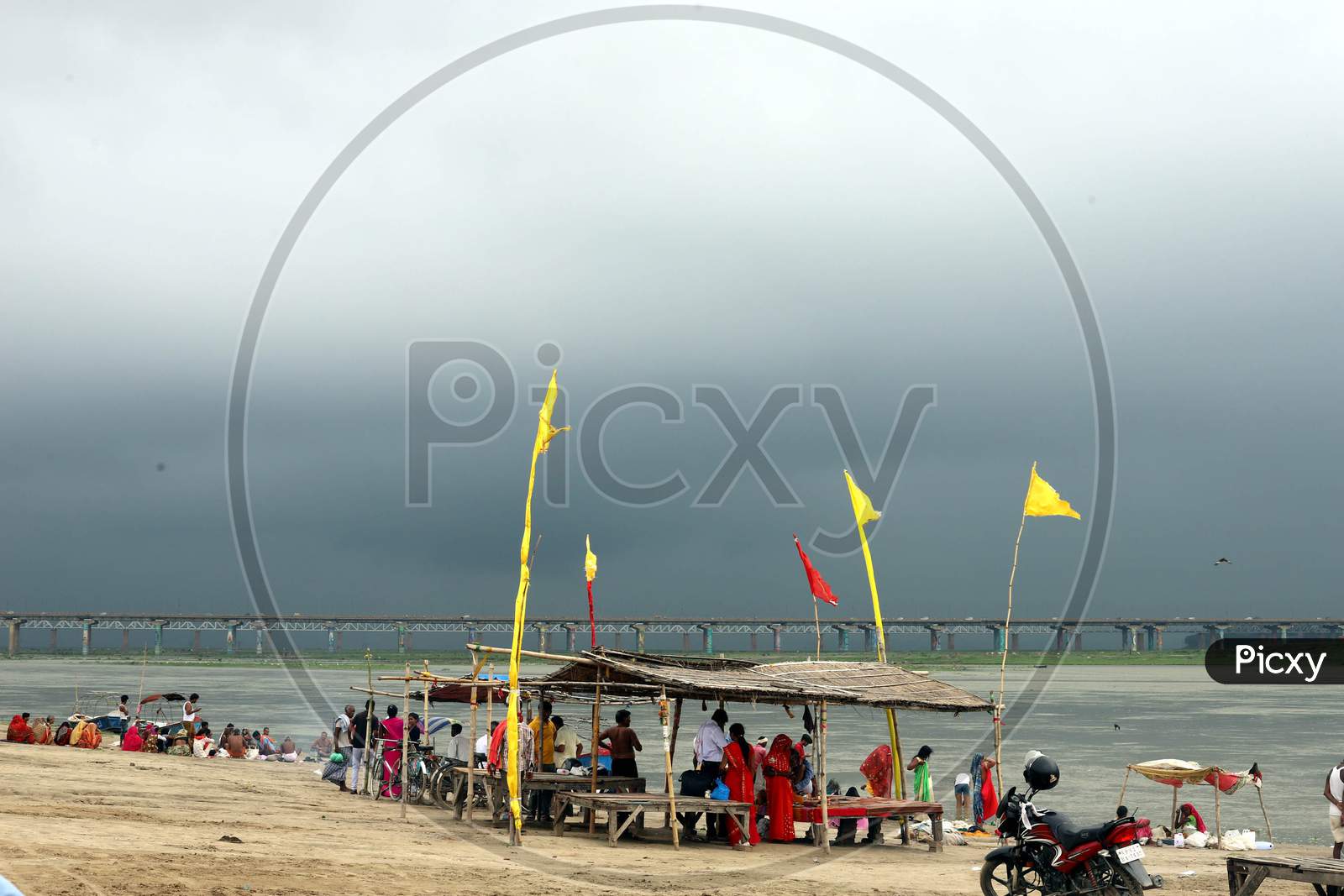 Dark clouds gather over the banks of River Ganga in Prayagraj on July 07, 2020