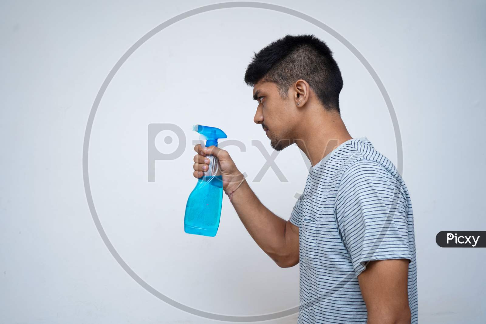 Young Asian Teen Boy Using Sanitizer To Prevent Covid-19.