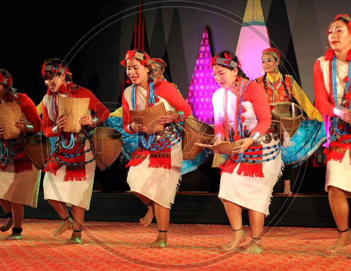 Artists from  Performing their traditional  dance