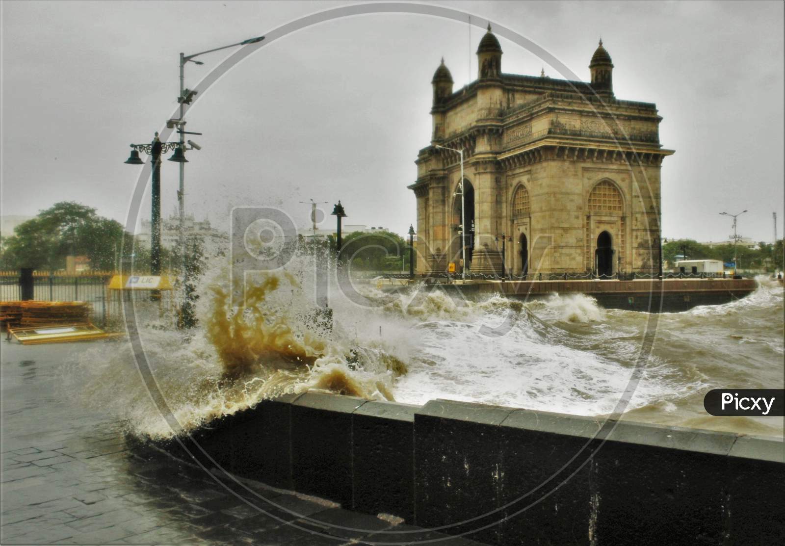 Waves crash at the Gateway of India during high tide in Mumbai, India on July 6, 2020.