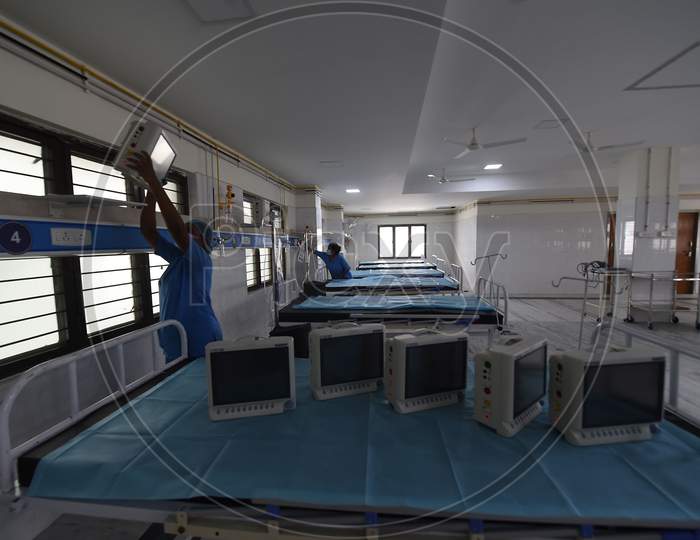 Health care workers arrange medical equipment in a building which belonged to the National Institute of Ageing that has been converted into a dedicated Covid-19 Care Centre in Chennai, Tamil Nadu on July 07, 2020