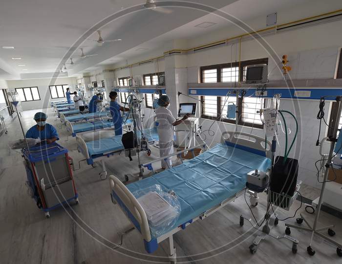Health care workers check medical equipment in a building which belonged to the National Institute of Ageing that has been converted into a dedicated Covid-19 Care Centre in Chennai, Tamil Nadu on July 07, 2020