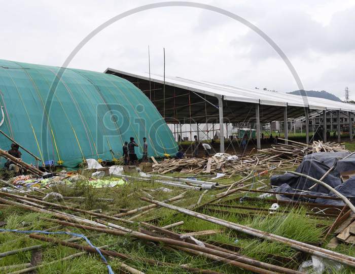 Workers carry materials  prepare a makeshift quarantine centre