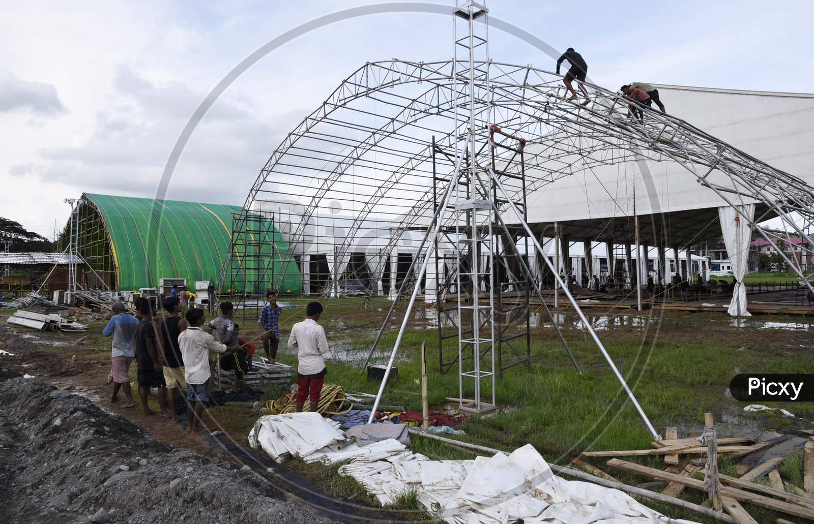 Workers build a quarantine center for treating COVID-19 patients