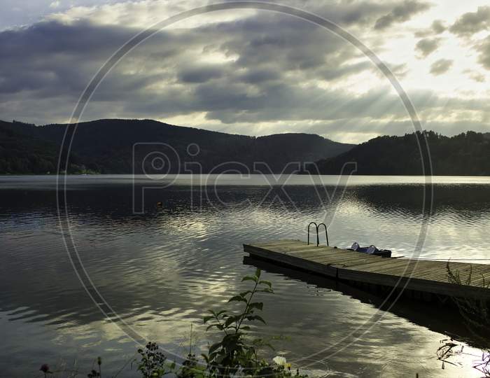 A Wide Angle View Of Roznowskie Lake Against Dramatic Sky Located In South Poland, Europe