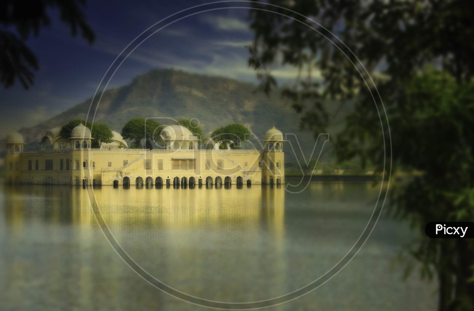 Close Up Telephoto Shot Of Jal Mahal ( Water Palace ) Before Mountain In Jaipur City Of Rajasthan State