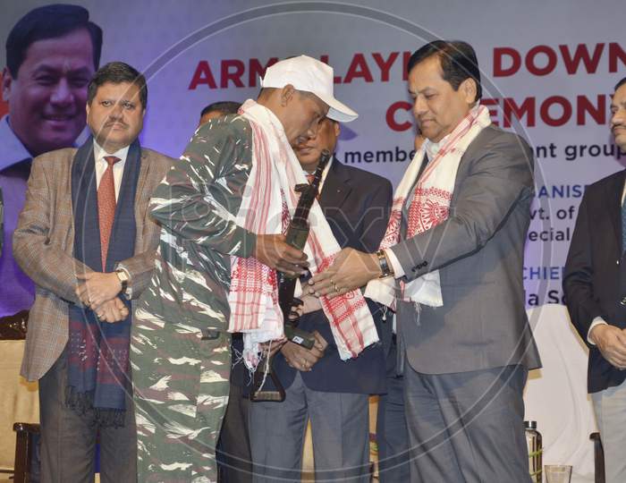 Members of Extremist Outfits hand over Arms to Assam Chief Minister Sarbananda Sonowal