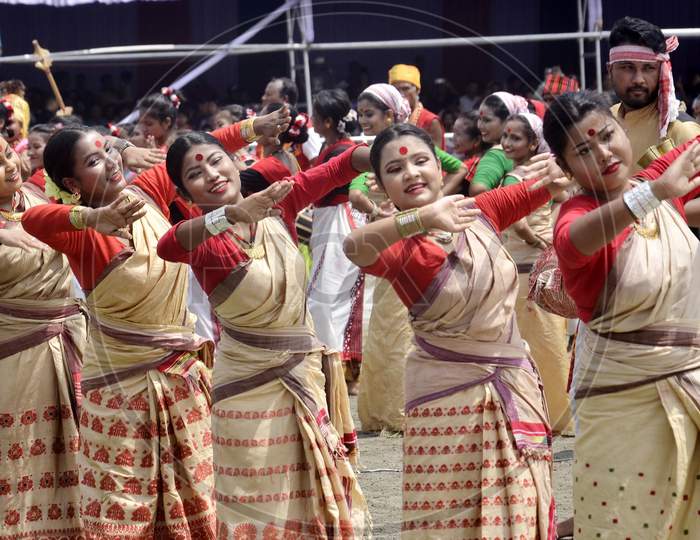 Artists performing traditional Assamese Bihu dance