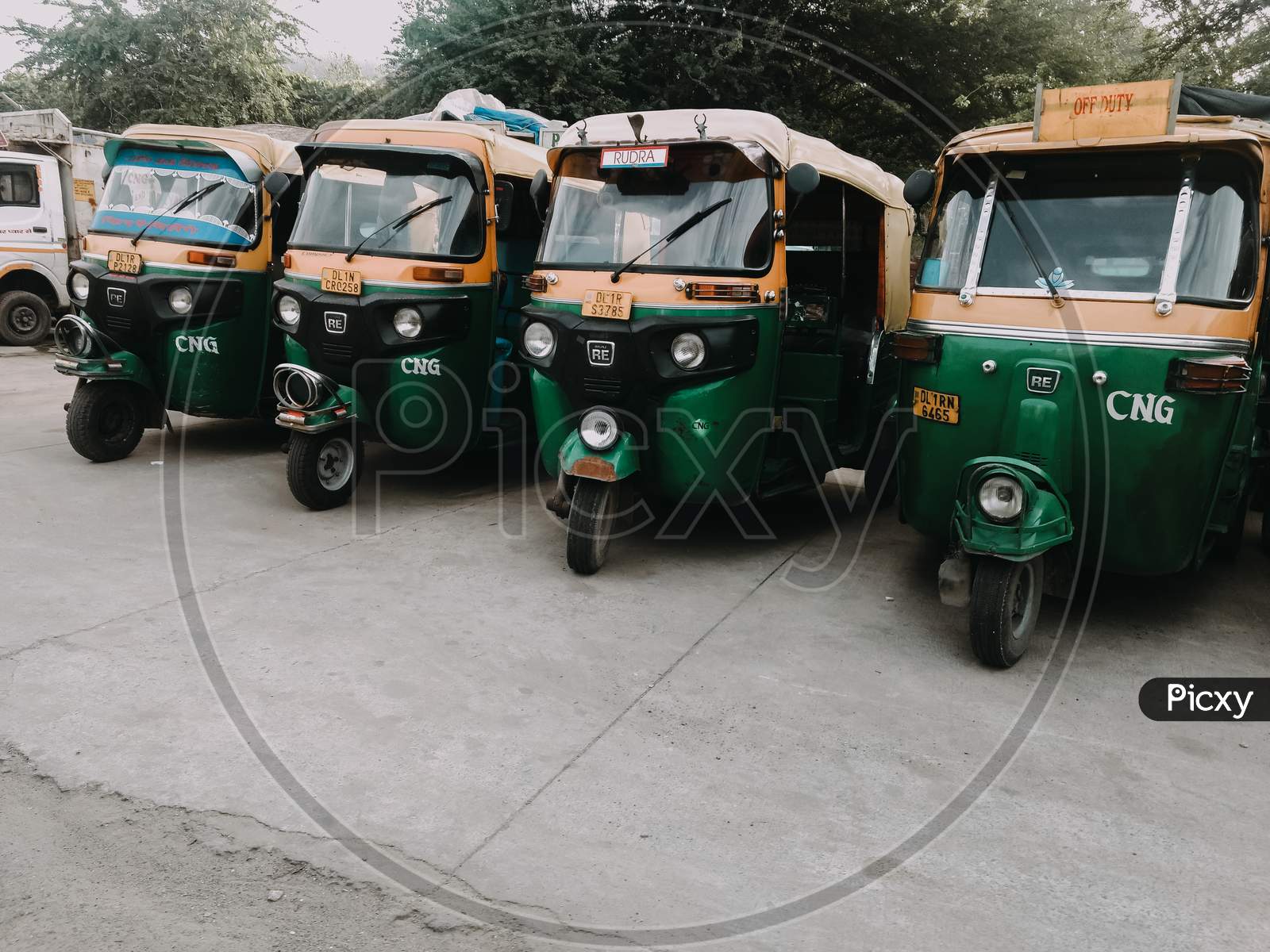 Delhi, India, 15 June 2020 - Group Of Indian Auto Rikshaw On The Street (Tuk-Tuk) Used By Tourists And Local As Means Of Transportation