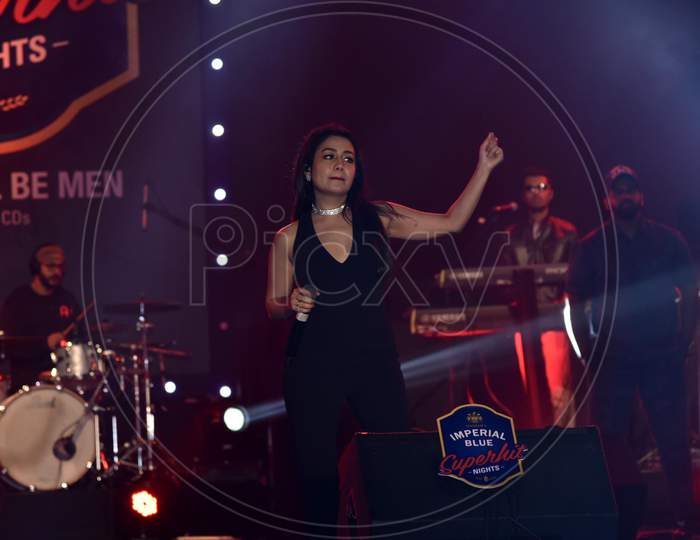 Bollywood Singer Neha Kakkar performing