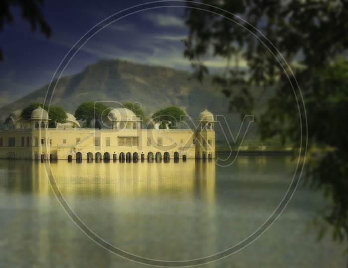 Close Up Telephoto Shot Of Jal Mahal ( Water Palace ) Before Mountain In Jaipur City Of Rajasthan State