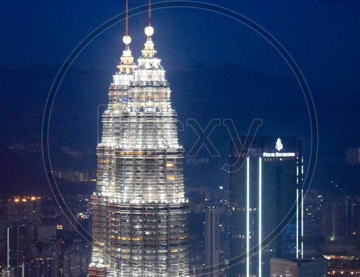 Kuala Lumpur, Malaysia, December 30, 2019: Cityscape Of Kuala Lumpur With Iconic Buildings Such As Petronas Twin Tower. Aerial View From Kl Tower In Kuala Lumpur Malaysia