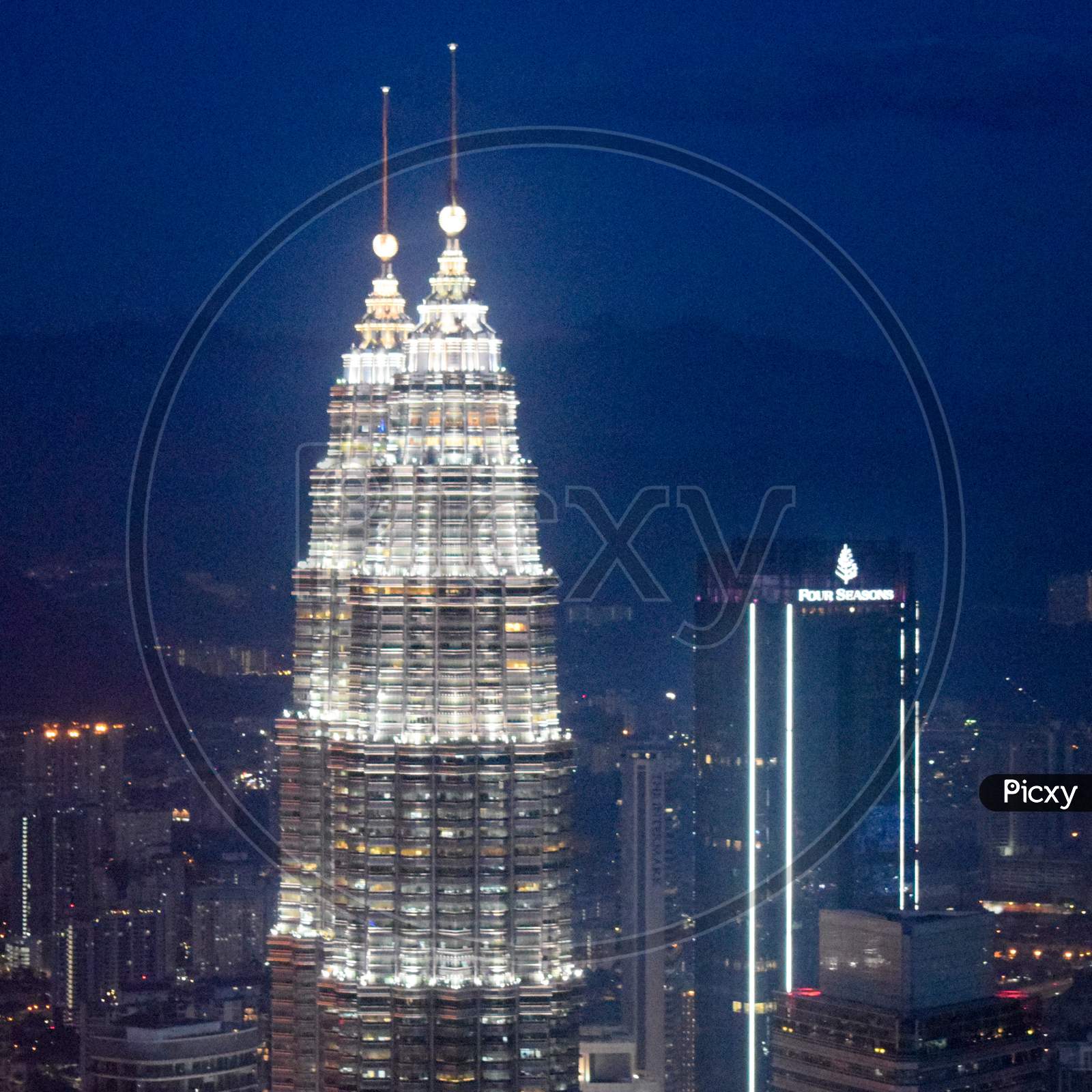 Kuala Lumpur, Malaysia, December 30, 2019: Cityscape Of Kuala Lumpur With Iconic Buildings Such As Petronas Twin Tower. Aerial View From Kl Tower In Kuala Lumpur Malaysia