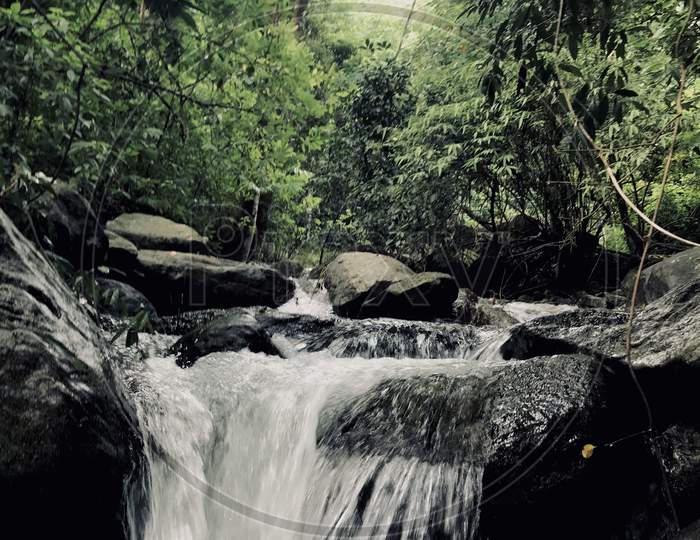 A water fall shot at at forest