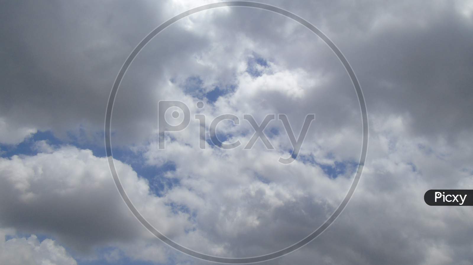 cloudy sky above agriculture land