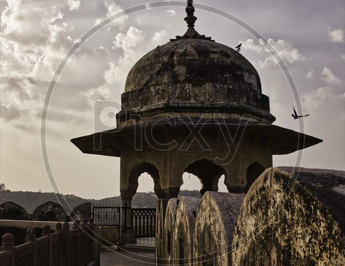 Dome Architecture Of A Fort Against Dramatic Sky Located In Jaipur City Of Rajasthan State In India