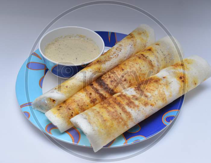 Traditional South Indian Dish (Dosa With Chutney) In A Dish