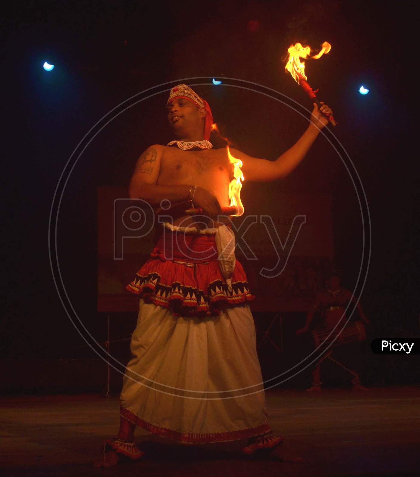 Artist from Sri Lanka performing dance  with fire