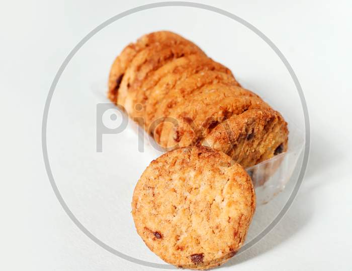 Homemade Cookies With Dried Grapes On Isolated White Background