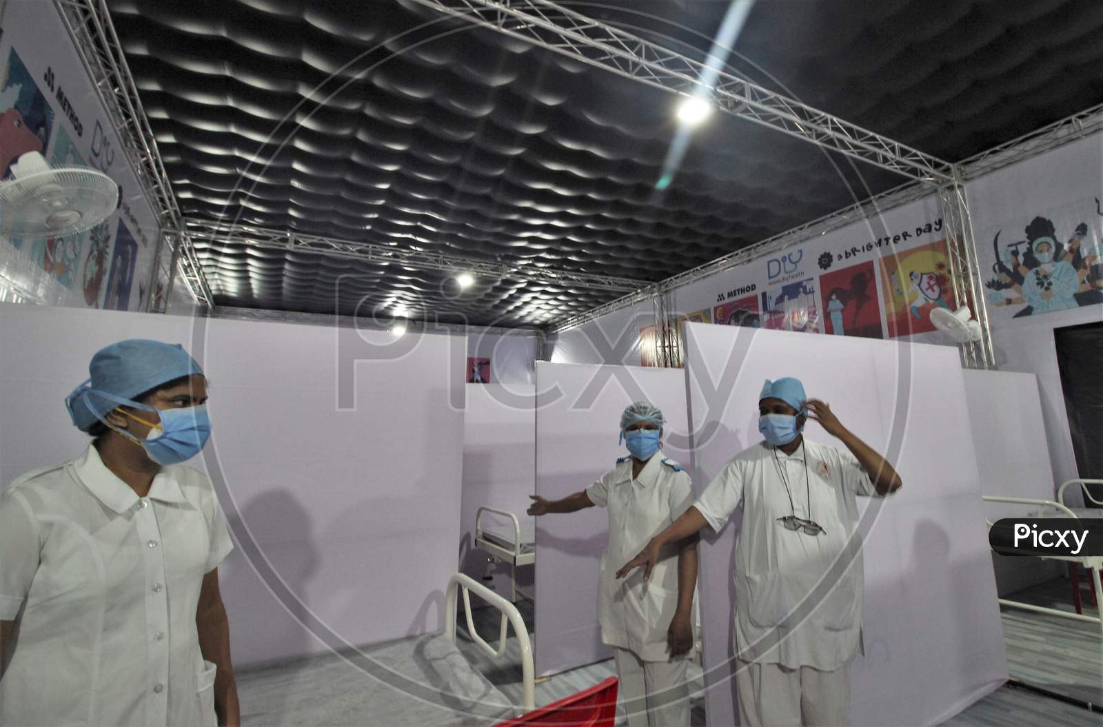 Nurses are seen showing around the newly inaugurated temporary facility created to screen cancer patients for covid-19, in Mumbai, India on July 30, 2020.