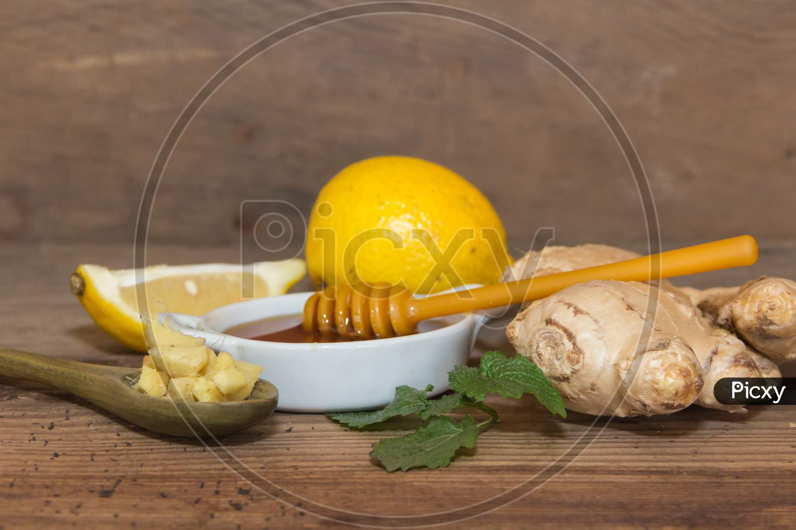 Composition Of Ginger Lemon Honey And Fresh Mint
