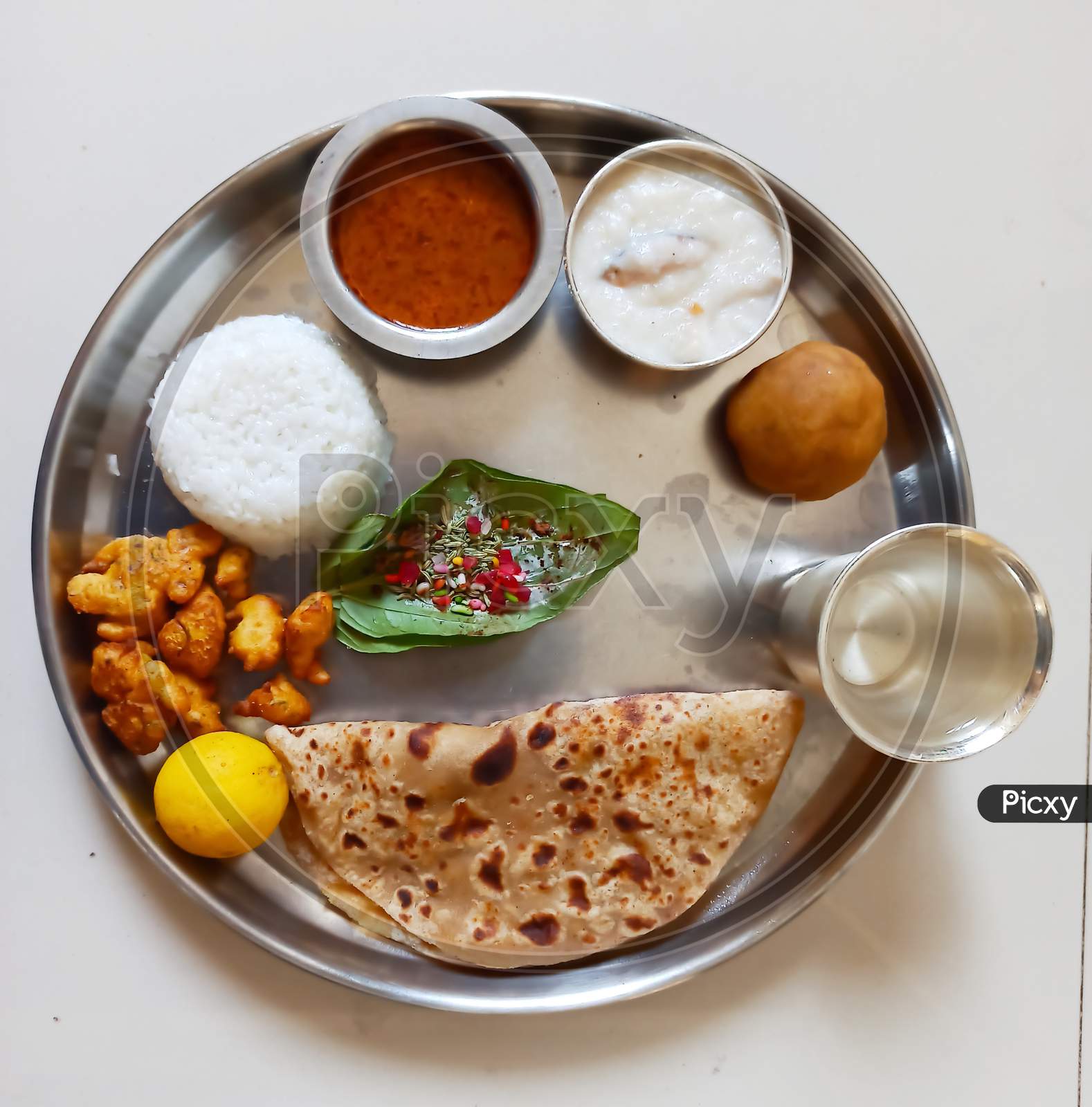 Indian special festival food thali with puranpoli