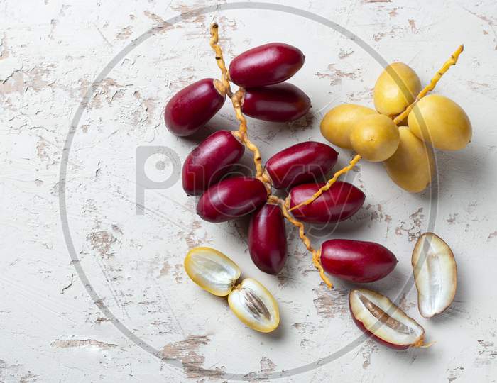 Yellow And Red Fresh Dates Fruit Isolate On White Background