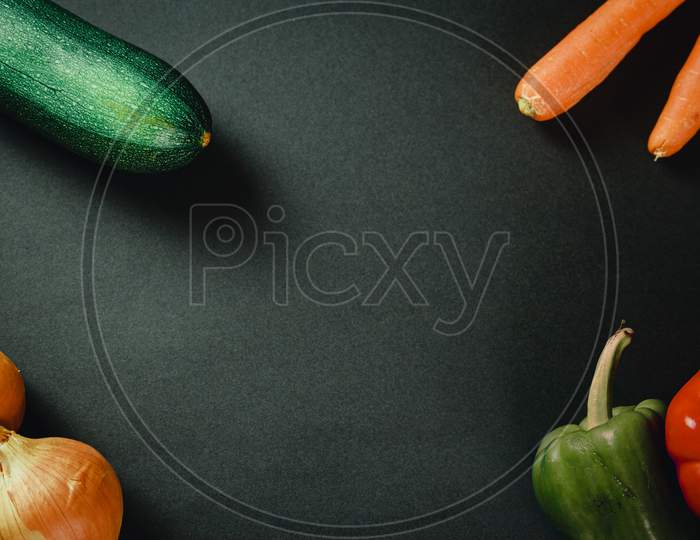 Bunch Of Vegetables Over A Dark Table