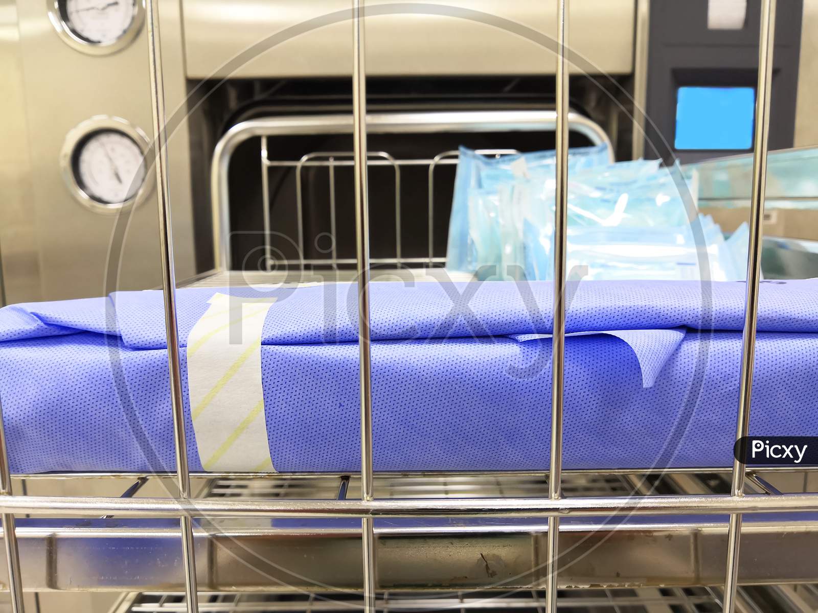 Surgical Instrument Set On Sterilization Machine Trolley