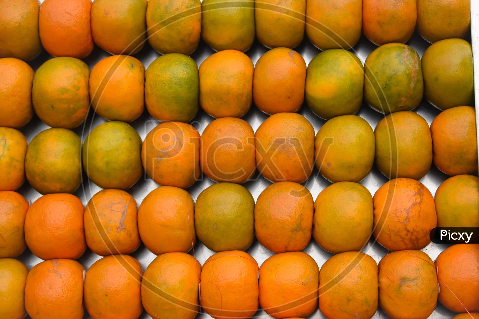 full frame shot of oranges in market