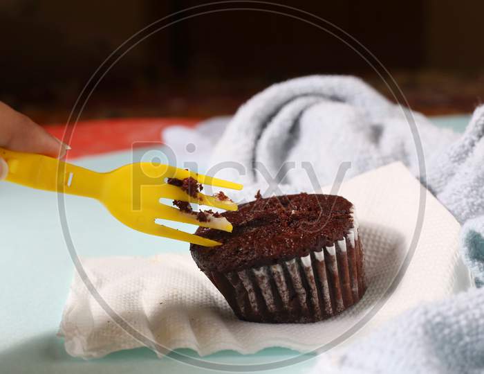 Homemade Chocolate Cupcake On Isolated Background