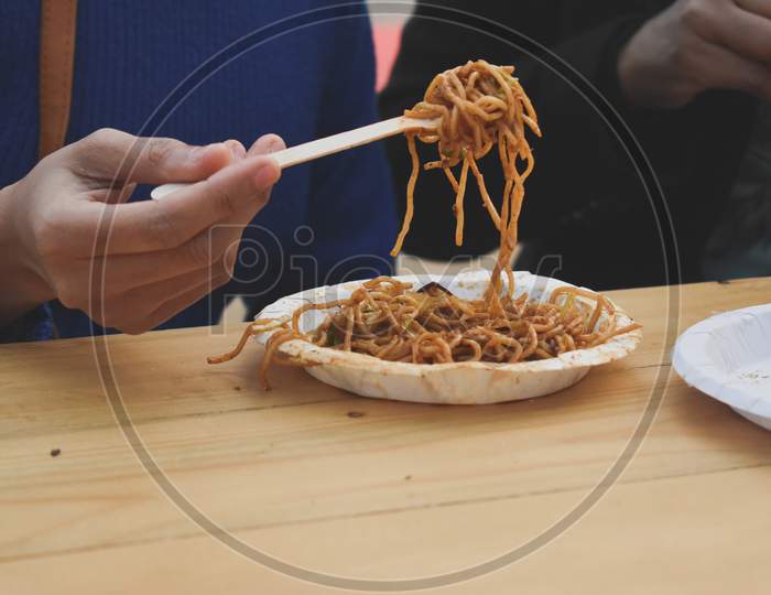 Eating Noodles