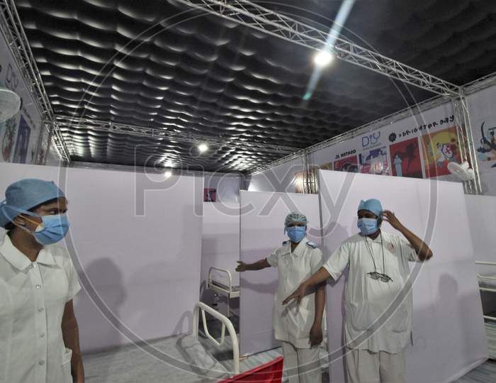 Nurses are seen showing around the newly inaugurated temporary facility created to screen cancer patients for covid-19, in Mumbai, India on July 30, 2020.
