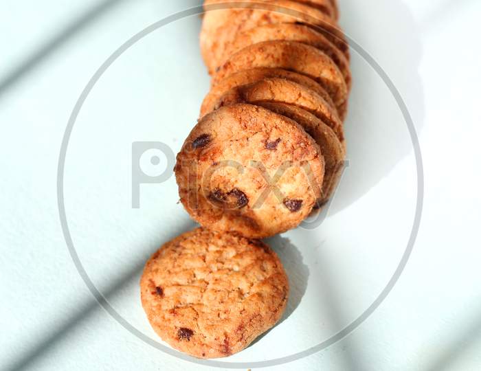 Homemade Cookies With Dried Grapes On Isolated White Background