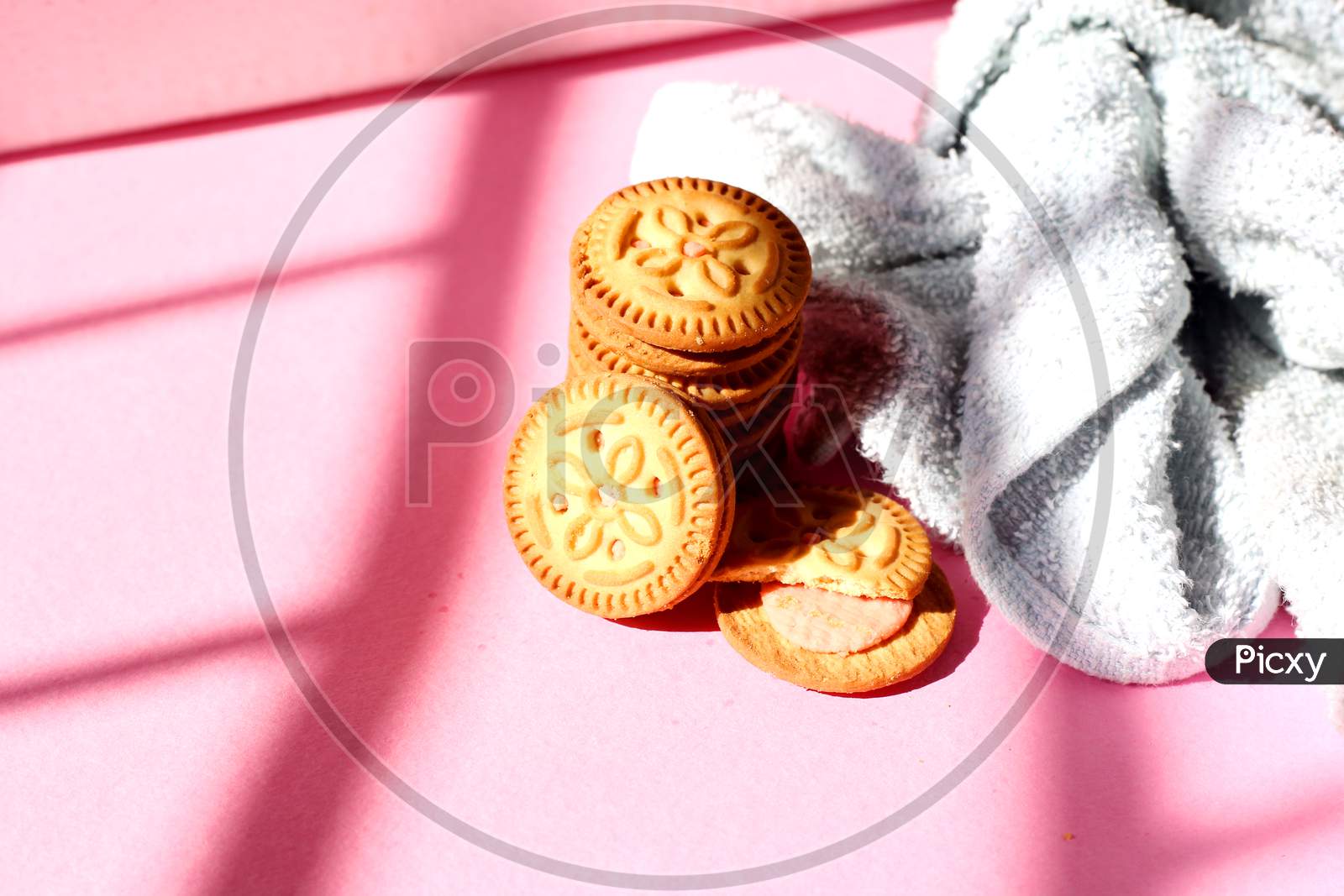 Stacked Biscuits On Pink Background