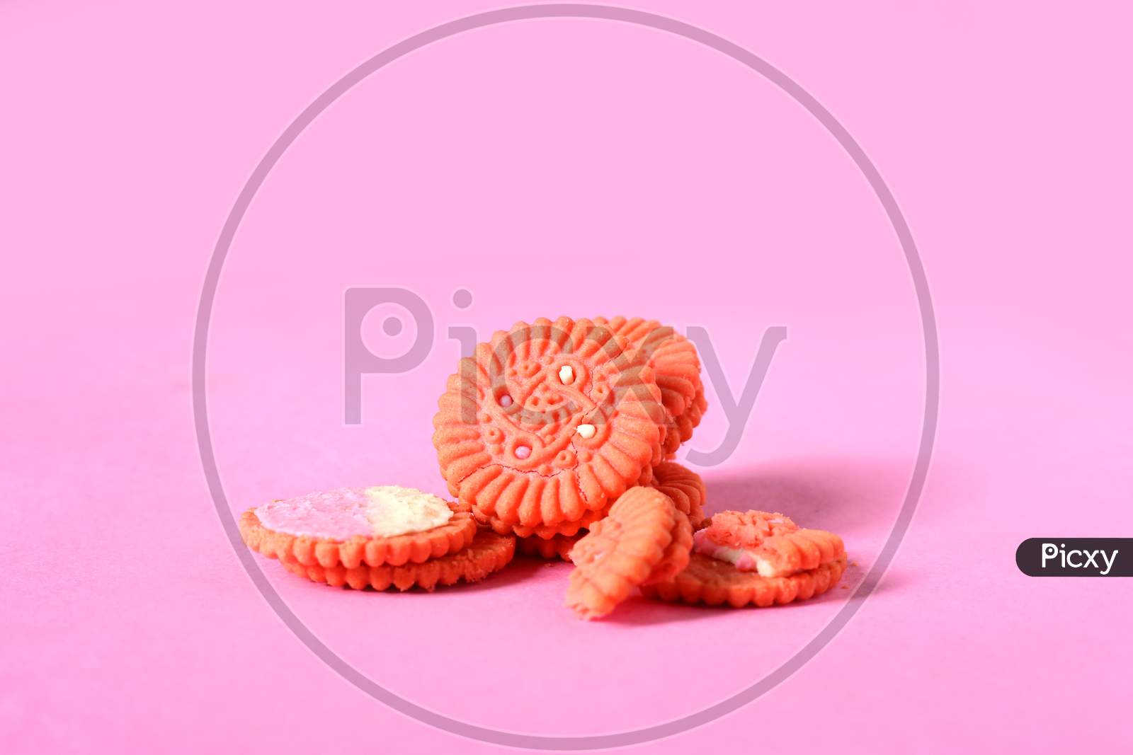 Cream Filling Pink Cookies On Isolated Pink Background