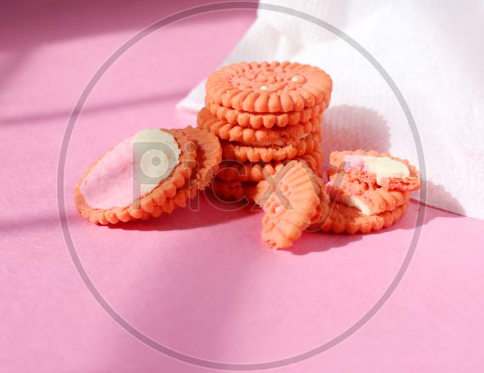 Cream Filling Pink Cookies On Isolated Pink Background