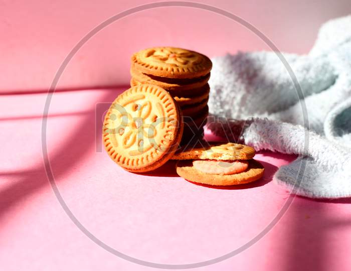 Stacked Biscuits On Pink Background