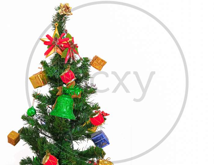 Beautiful Christmas Tree Decorated With Lights And Ornaments