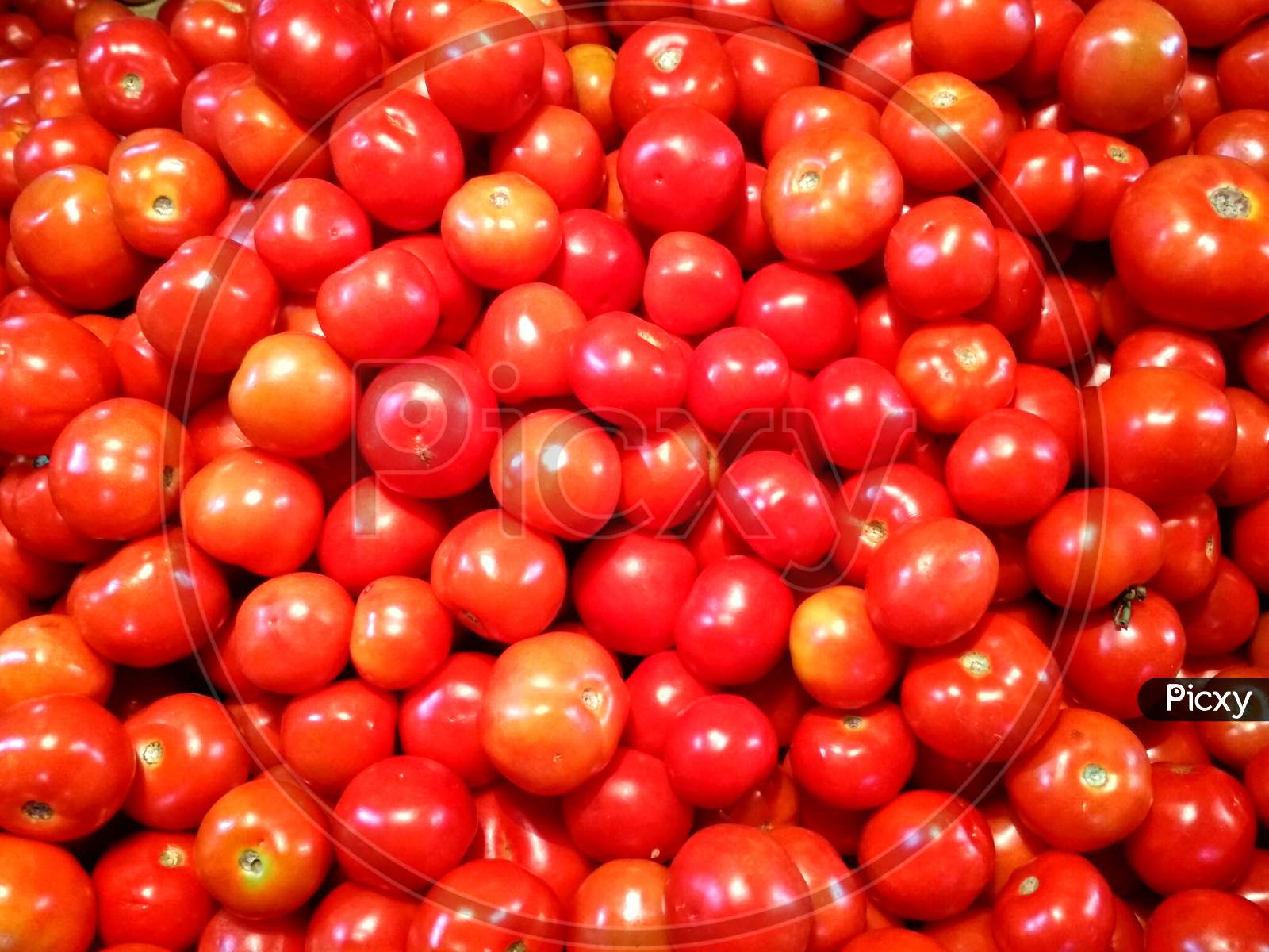Tomatoes Ready To Be Sold In A Vegetable Market