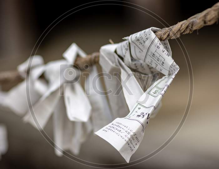 Omikuji Fortunes Written On Strips Of Paper At Buddhist Temple In Nara, Japan