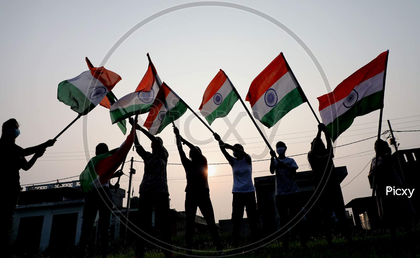 Girls hold the tricolor during rehearsals ahead of Independence Day at Jammu on August 10 ,2020.