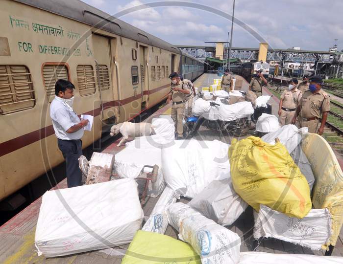 Railway Police Force (Rpf) Personnel Inspect Platform Along With A Sniffer Dog, Ahead Of The Independence Day Celebrations, In Guwahati On Monday, Aug 10, 2020.