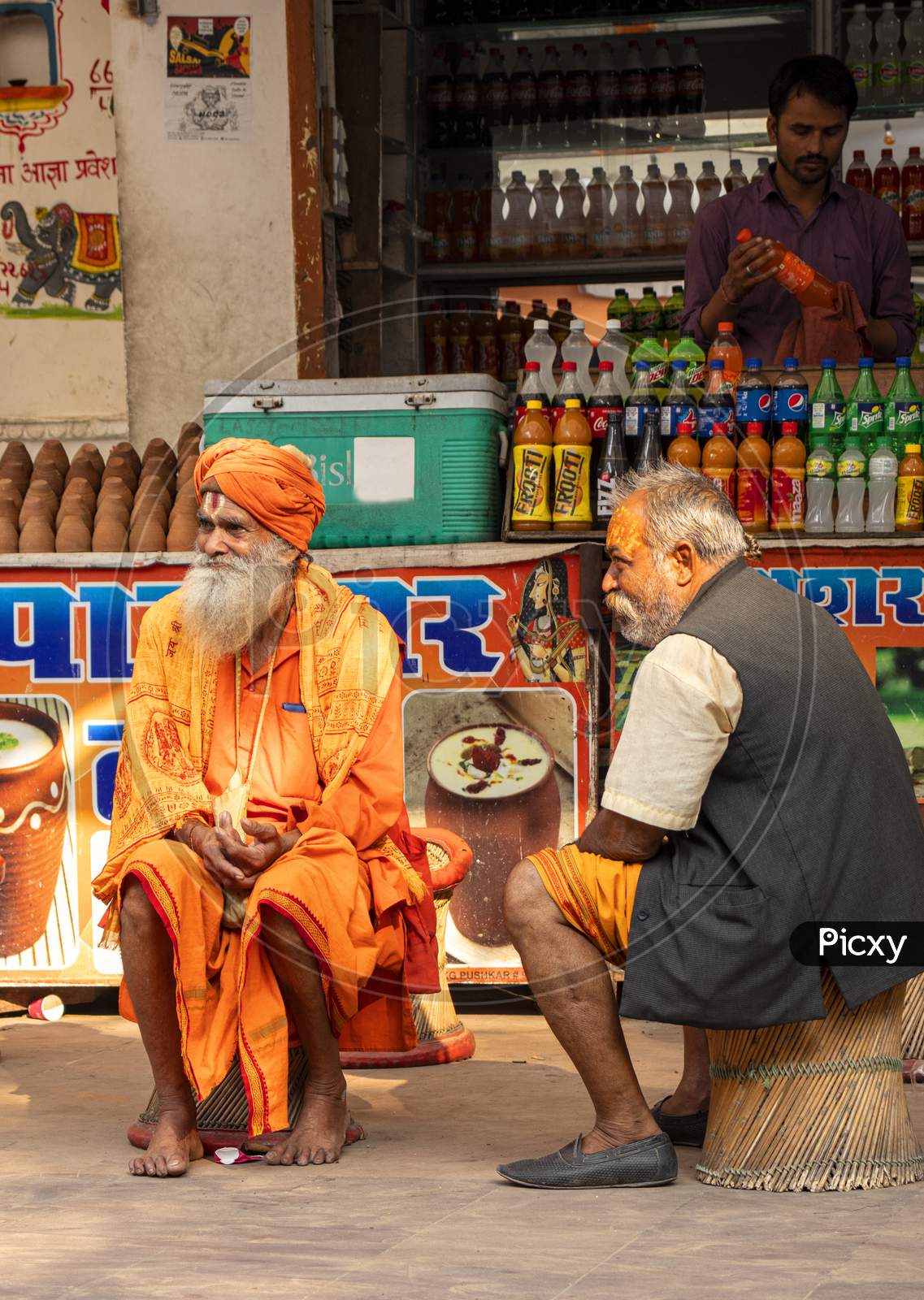 11 December 2019 Pushkar Rajesthan, India Sadhu (Saint) Is Sitting Out Side Shop