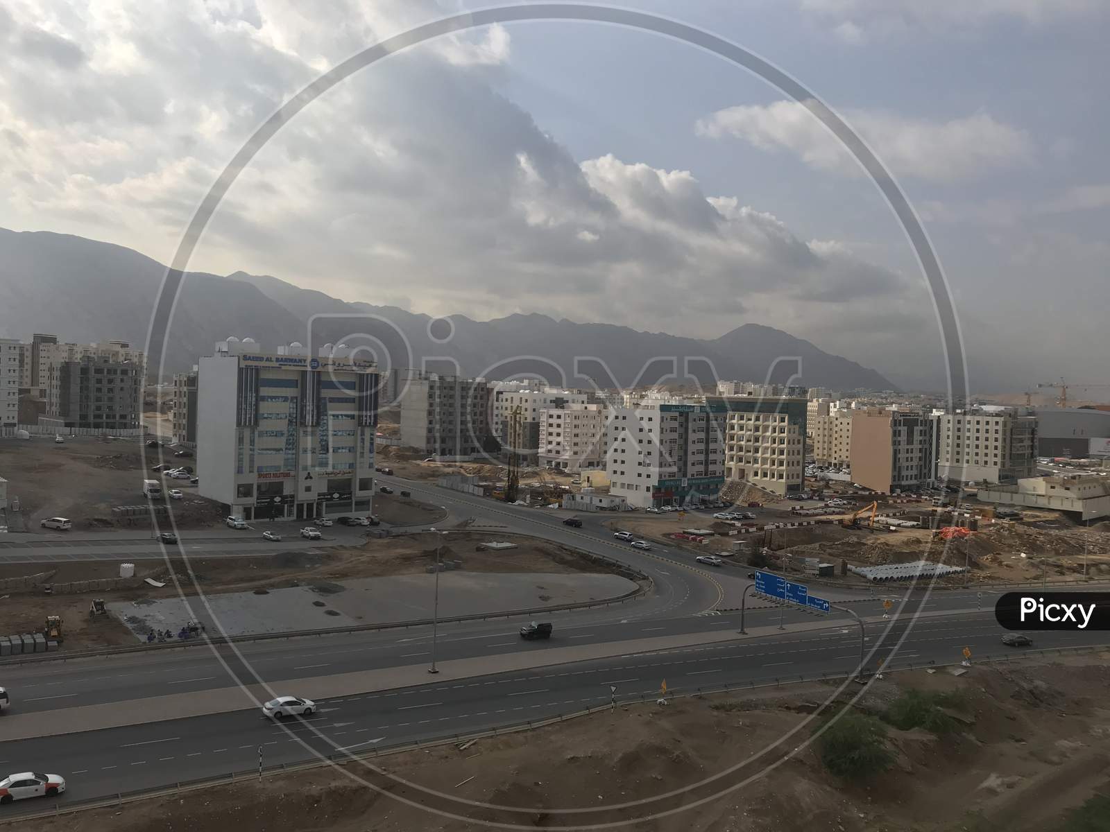 Muscat City With Cloudy Sky Background And Is Such A Beautiful View Of Cityscape Of Oman Country In Aerial View