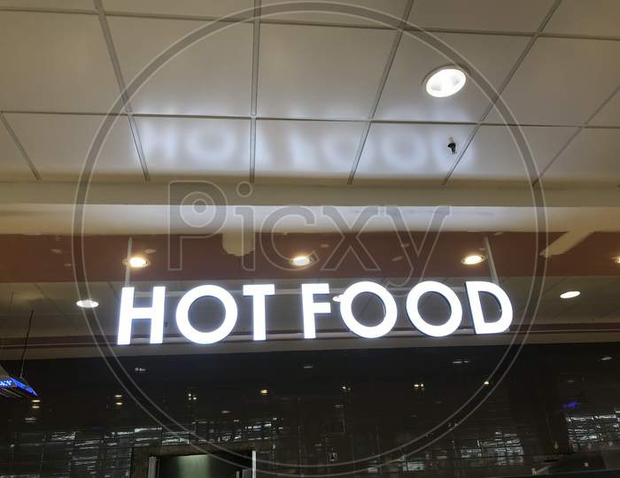 Hot Food Name Board Fixed For An Newly Opened Business Of Selling Cooked Food Items In The Event Of Functions Upon Orders For Their Celebrations