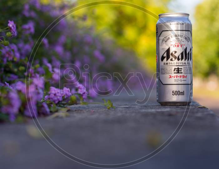 Can Of Popular Japanese Asahi Beer, In A Park